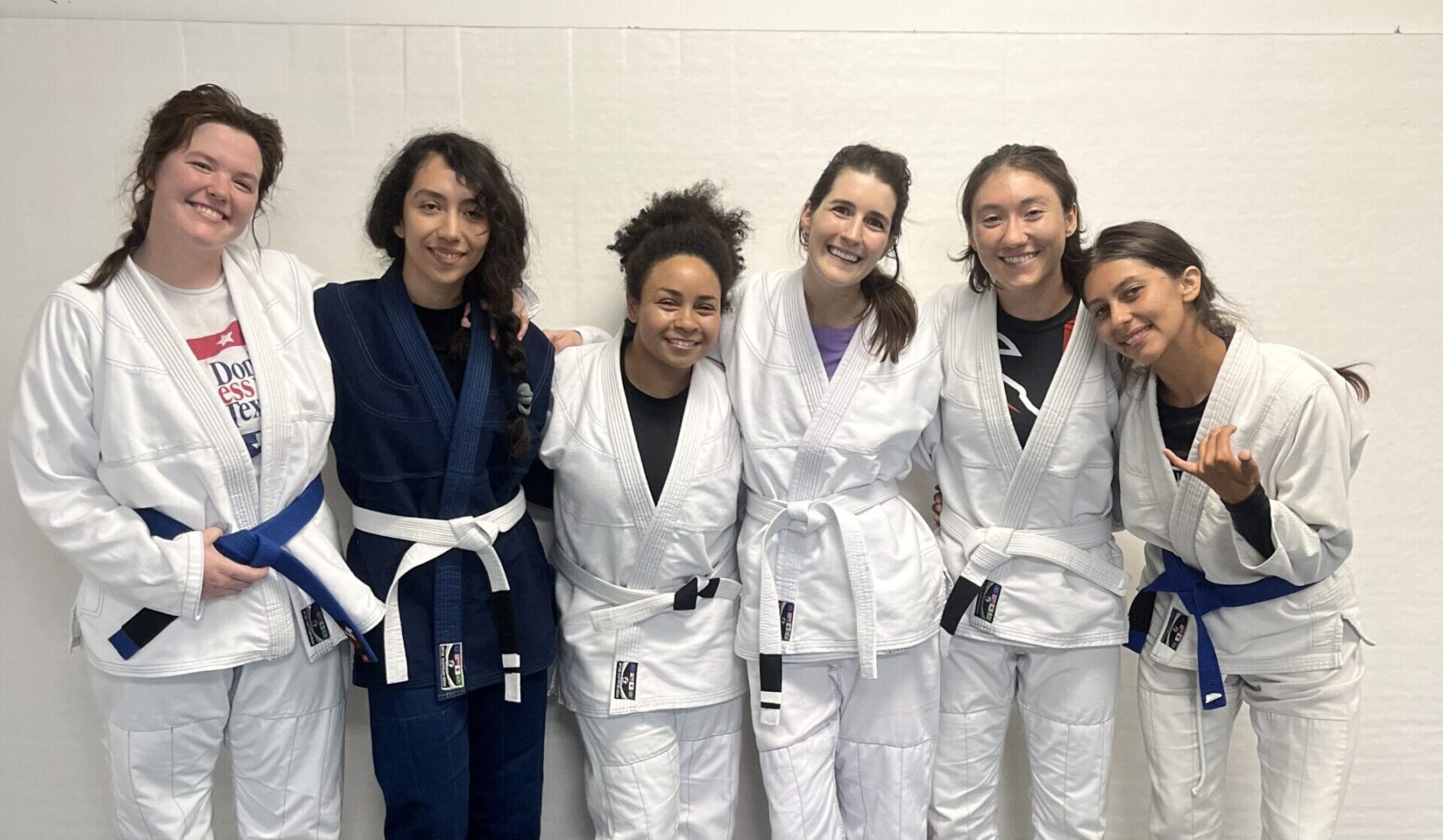 6 women after women’s jiu-jitsu class at Dark Horse, Denver